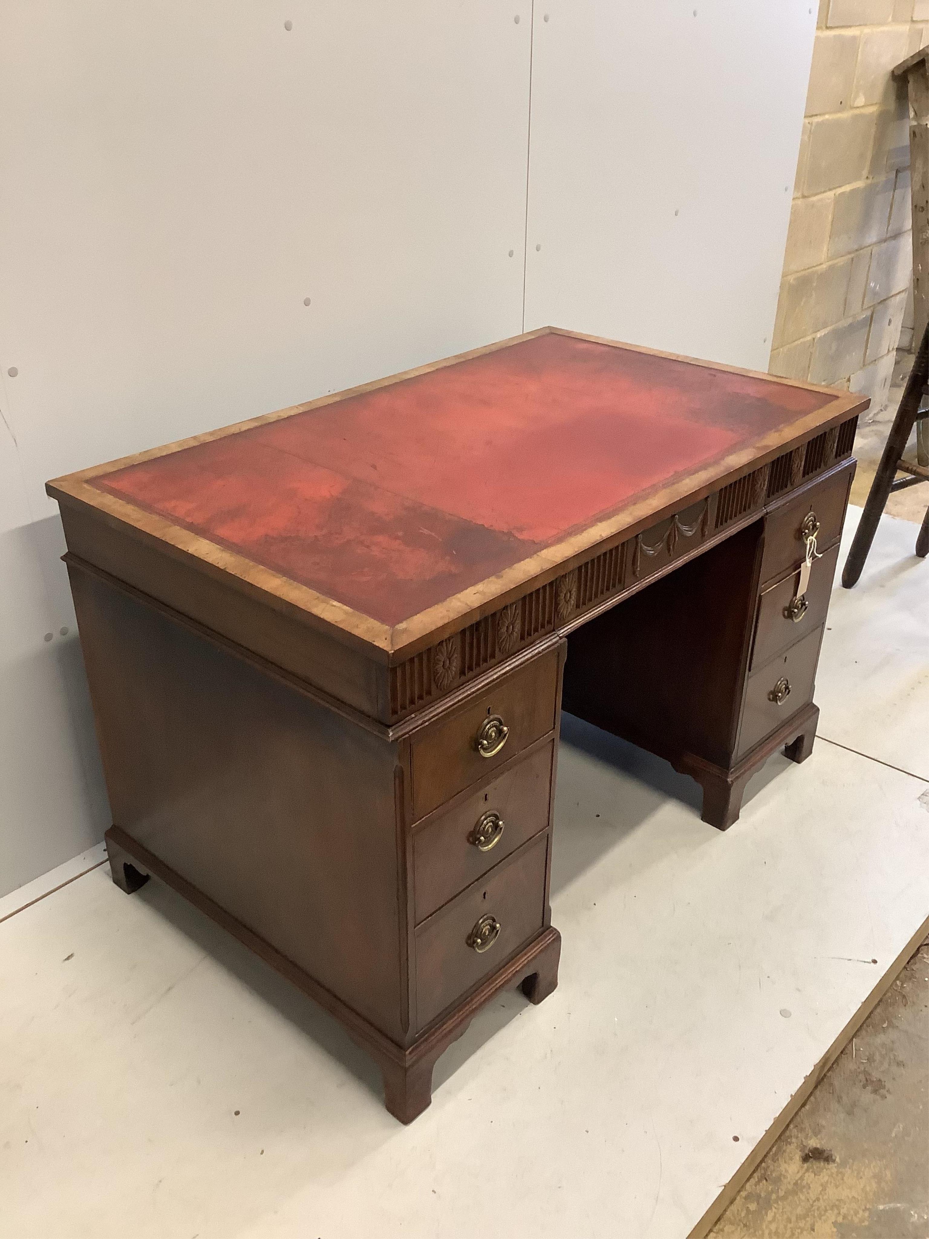 An early Georgian style walnut pedestal desk with inset leather top, width 117cm, depth 71cm, height 77cm. Condition - fair to good